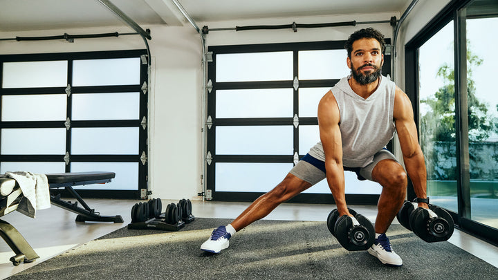 Man exercising with the Results Series 52 dumbbell