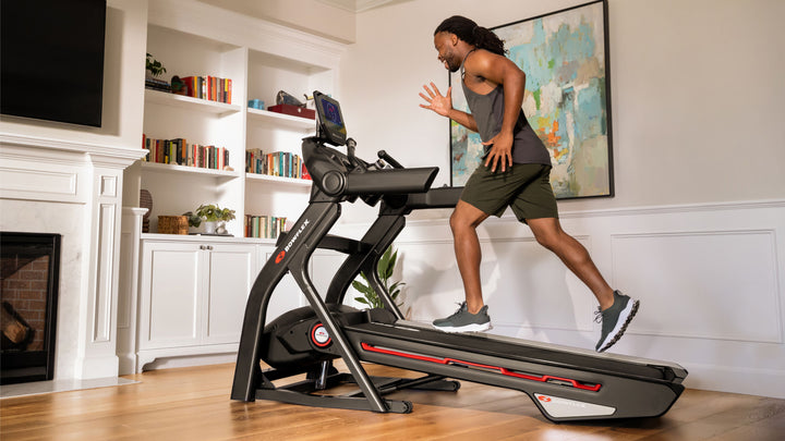 Man running on an incline on the Treadmill 10