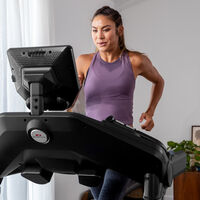 A woman running on a treadmill 10.--thumbnail