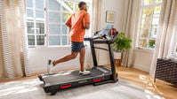 Man running on BXT8J treadmill--thumbnail